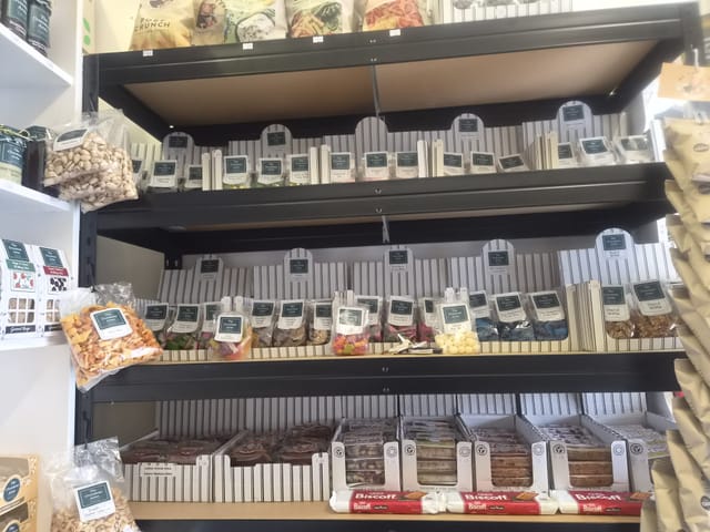 Bagged sweets and peanut brittle on the shop shelves